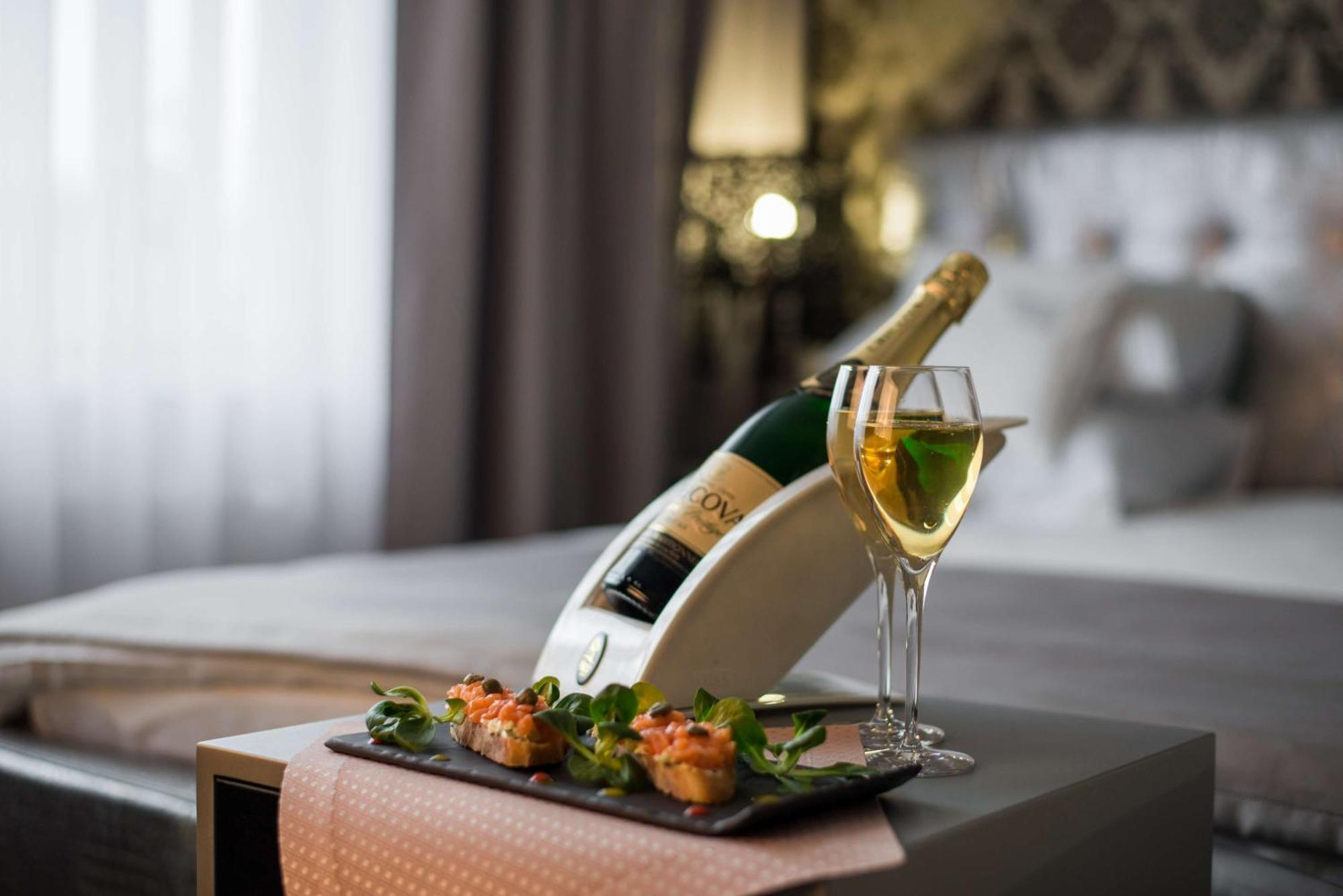 Radisson Jaipur City Center Exterior photo A bottle of champagne